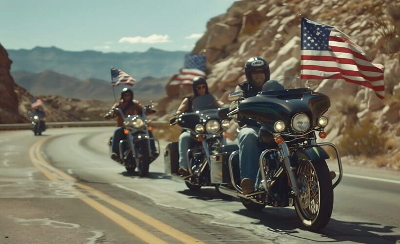 image of motorcyclists riding with the American falg - learn the motorcycle helmet laws by state with Motohorse, a motorcycle accessories & parts online shop